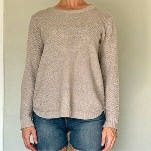 Tan, knit sweater with crewneck and cute waistline